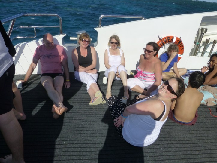 Catching some rays on the front on the boat before the ride home